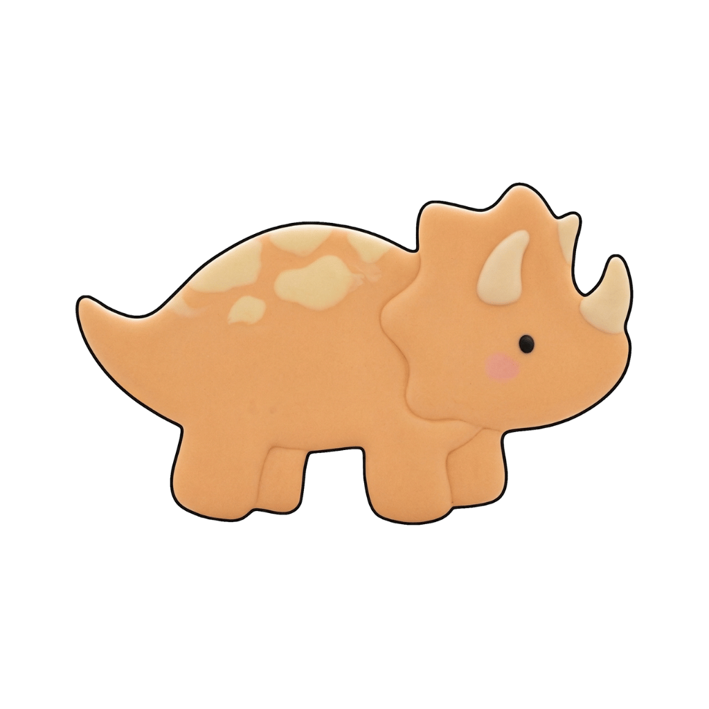 Peach triceratops cookie with cream horns and pale spots