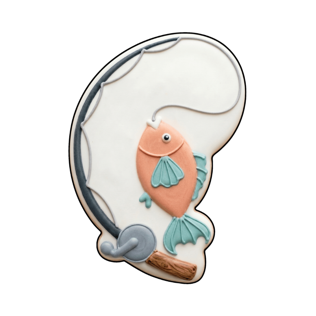Fishing rod cookie with a peach fish hanging from the line