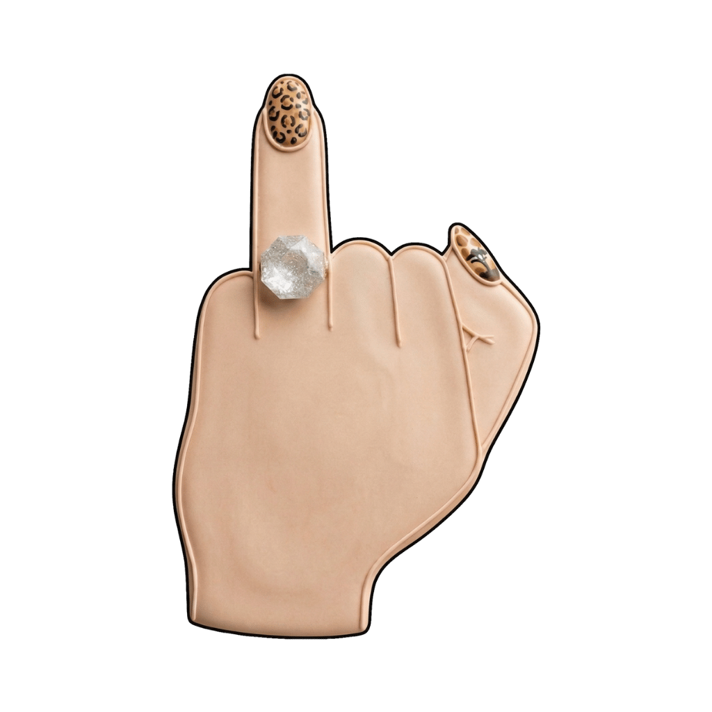 Bridal ring finger cookie with a clear engagement ring and leopard-print manicure accents