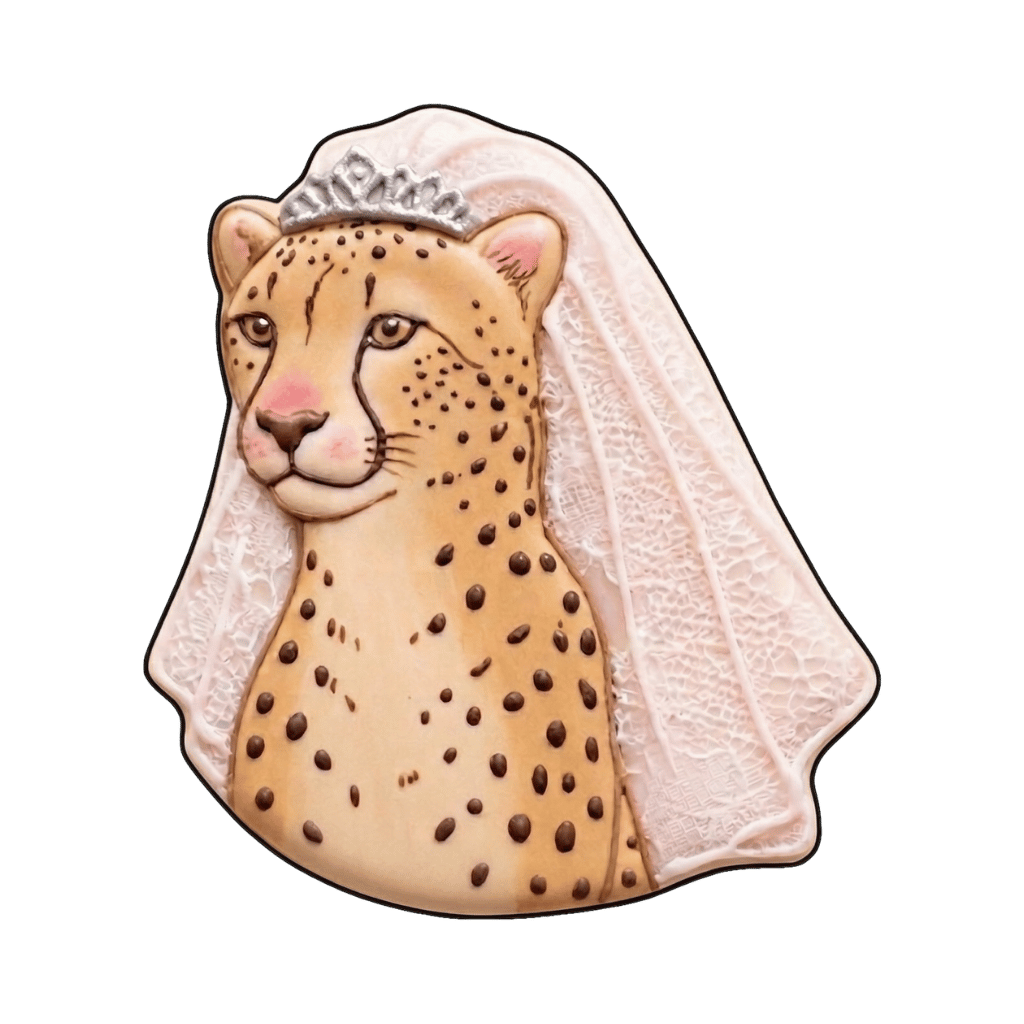Cheetah bride portrait cookie with a silver tiara and long white lace veil