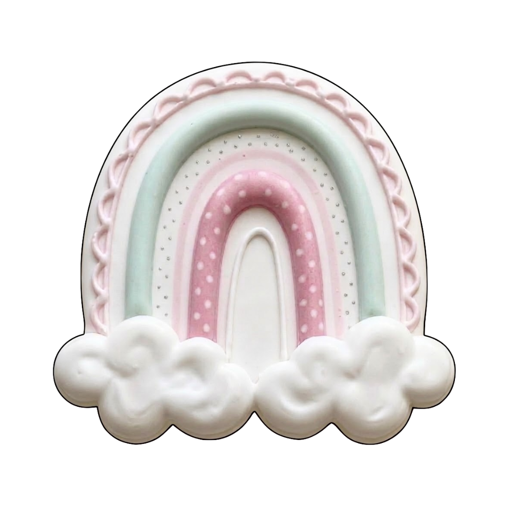 Pastel rainbow plaque cookie with scalloped border, dotted details, and soft cloud base